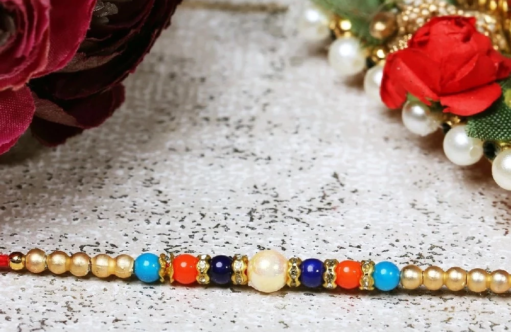 Beads and Kundan Rakhi - Image 1