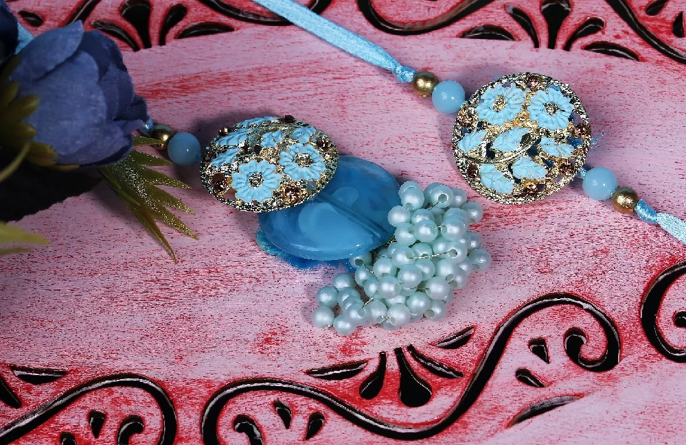 Charming Blue Bhaiya Bhabhi Rakhi - Image 1