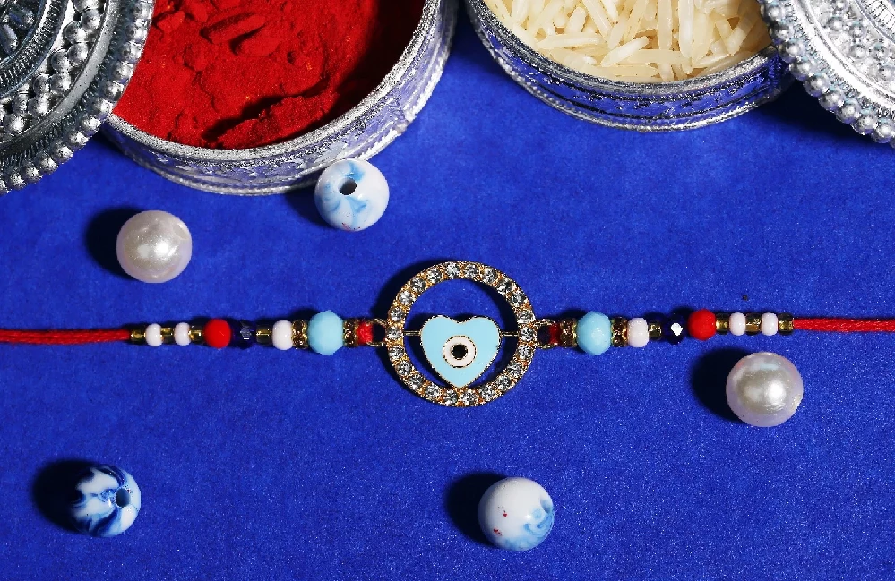 Heart Shaped Evil Eye Rakhi - Image 1