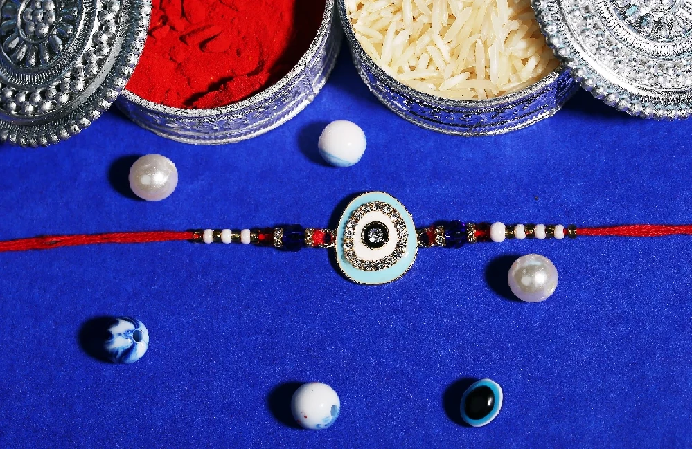 Oval Shaped Evil Eye Rakhi - Image 1
