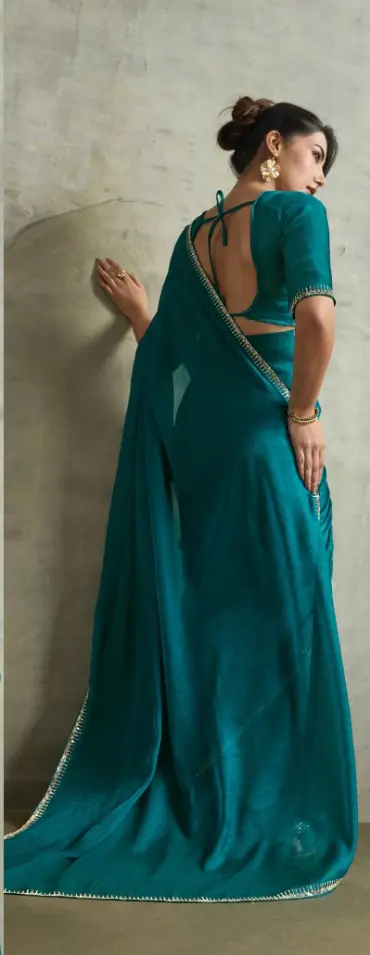 Roykals Teal Fendy Chiffon Blooming Designer Saree with Latkan Roykals Teal Fendy Chiffon Blooming Designer Saree with Latkan-Design No.-RT13487 - 213081