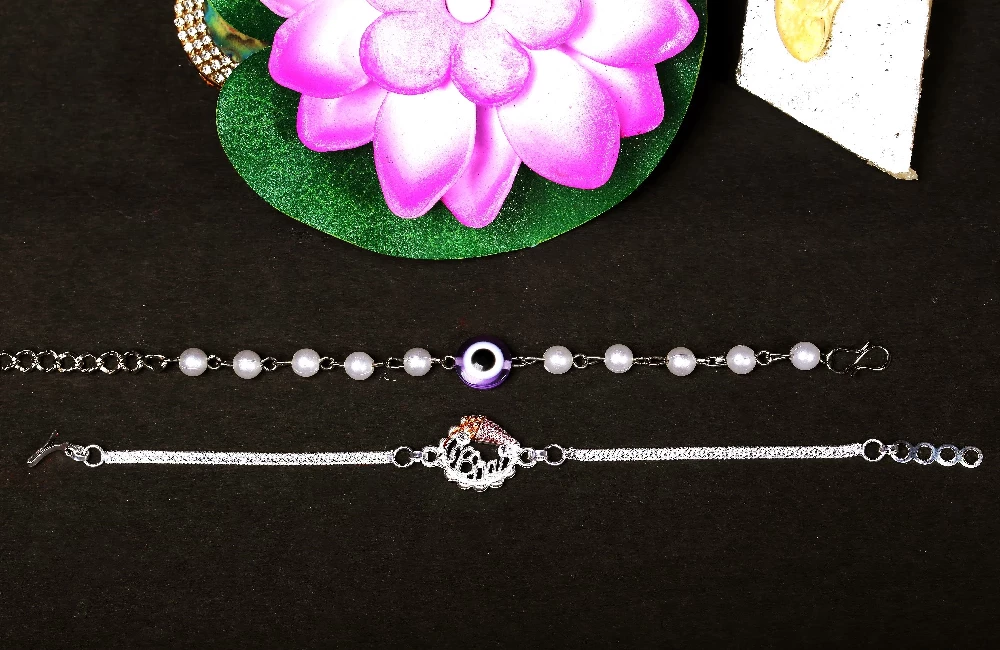 Silver Plated Braclet Bhaiya Bhabhi Rakhi - Image 1
