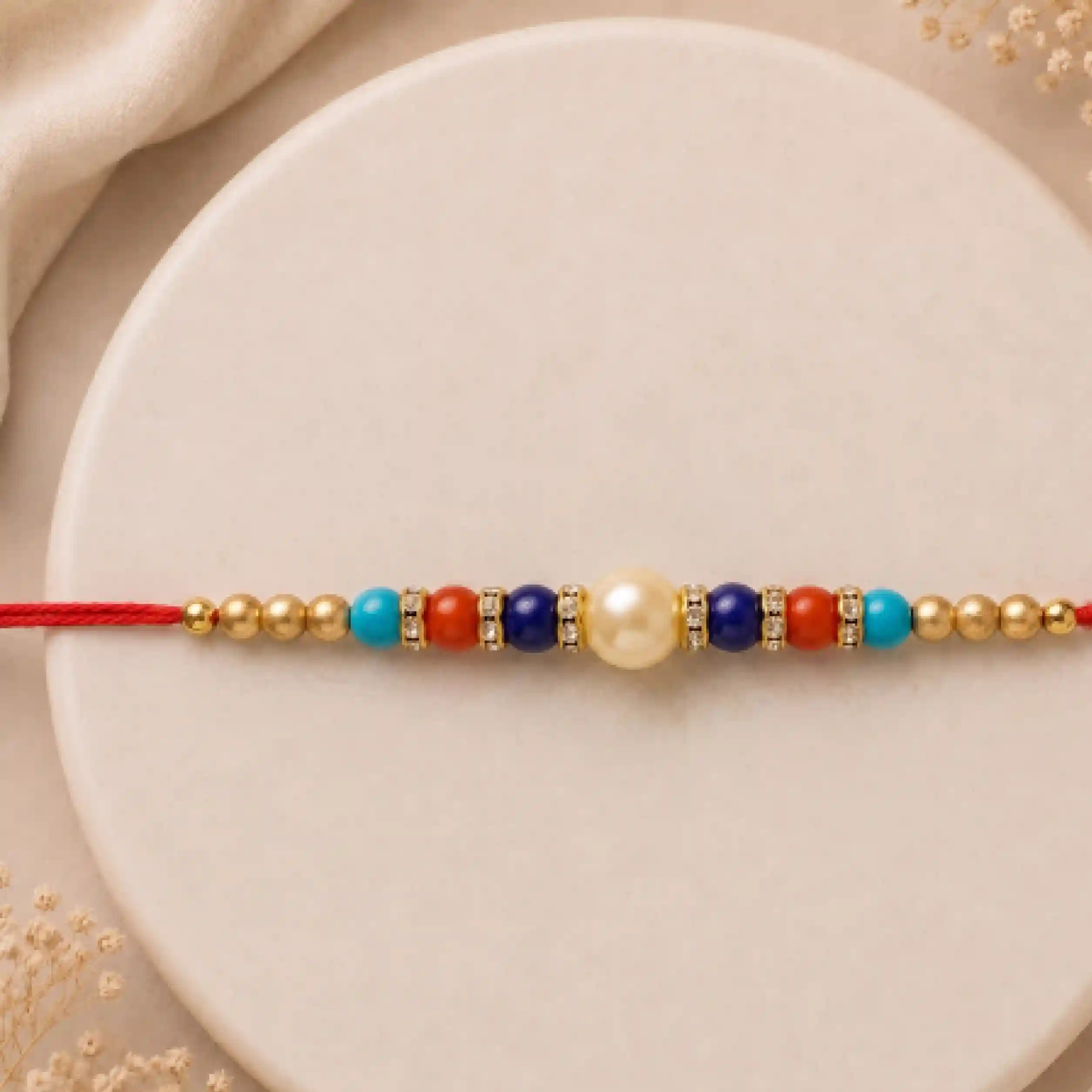 Beads and Kundan Rakhi