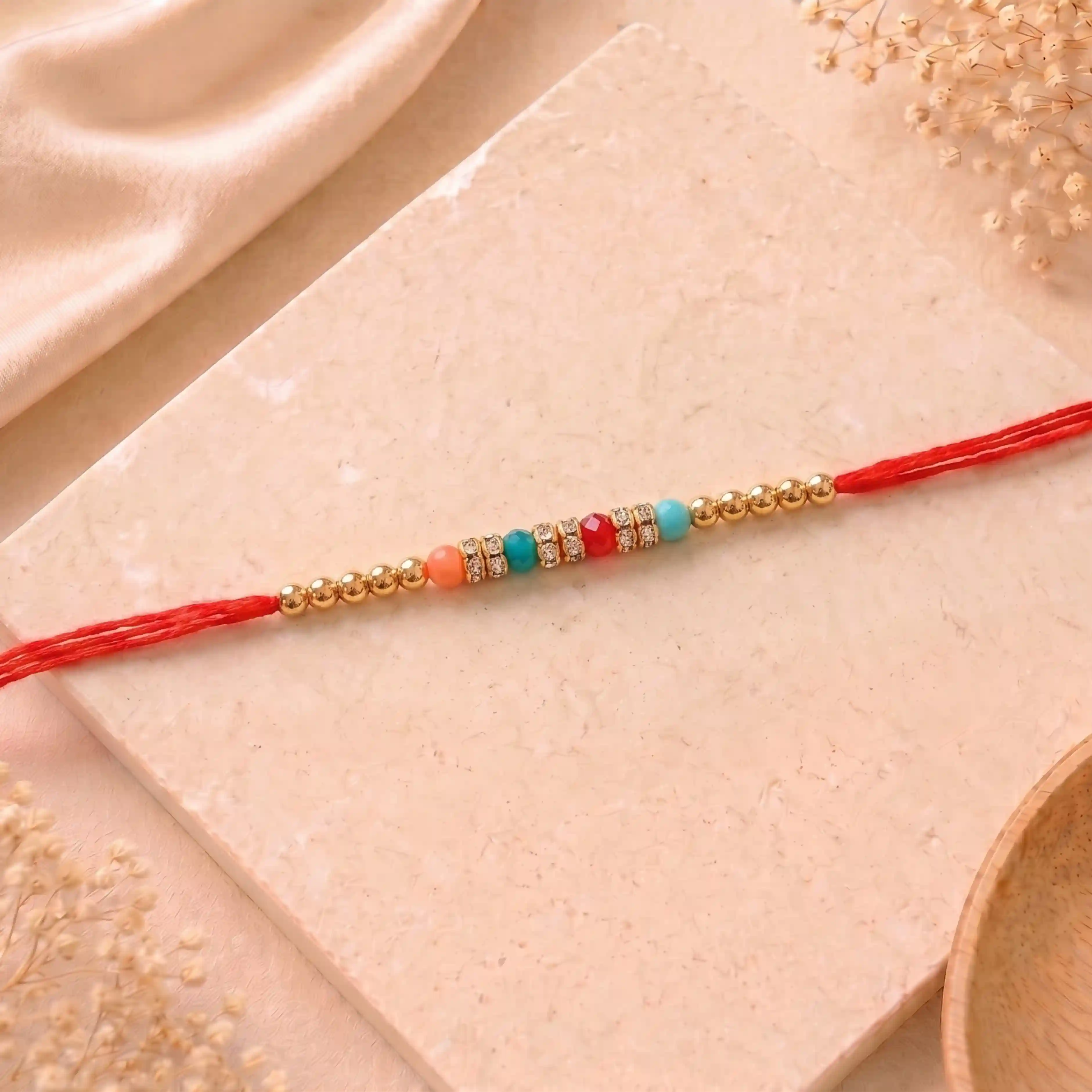 Elegant Beads and Kundan Rakhis