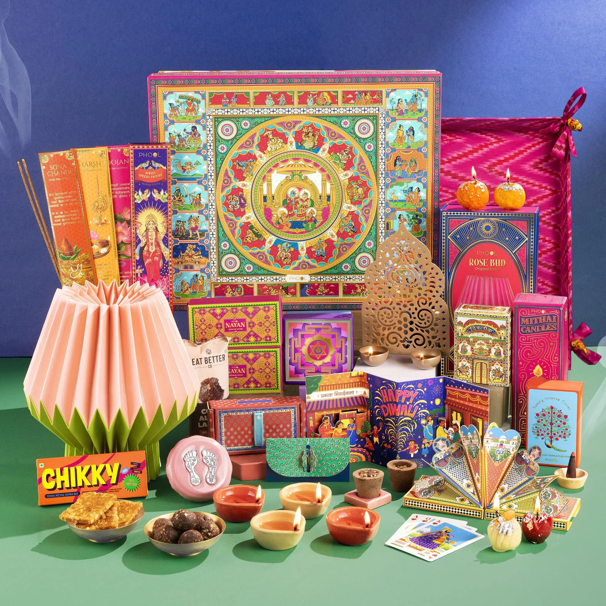 Phool 13 Item Diwali Lantern Gift Box with Ceramic Diya, Chocolate Ladoo, Chikky, T-Light Lantern, Candles, Incense, Hawan Cups, Oil Burner & Oil-7